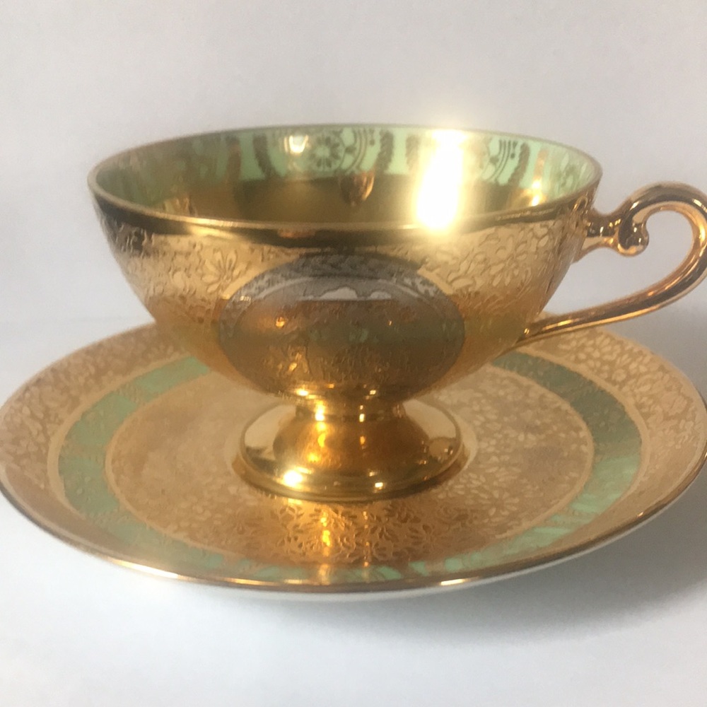 Bohemia 24 karat gold cup with saucer
